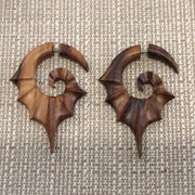 Wooden bat winged faux gauges
