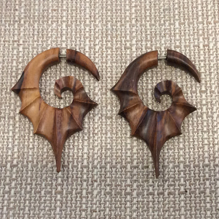 Wooden bat winged faux gauges